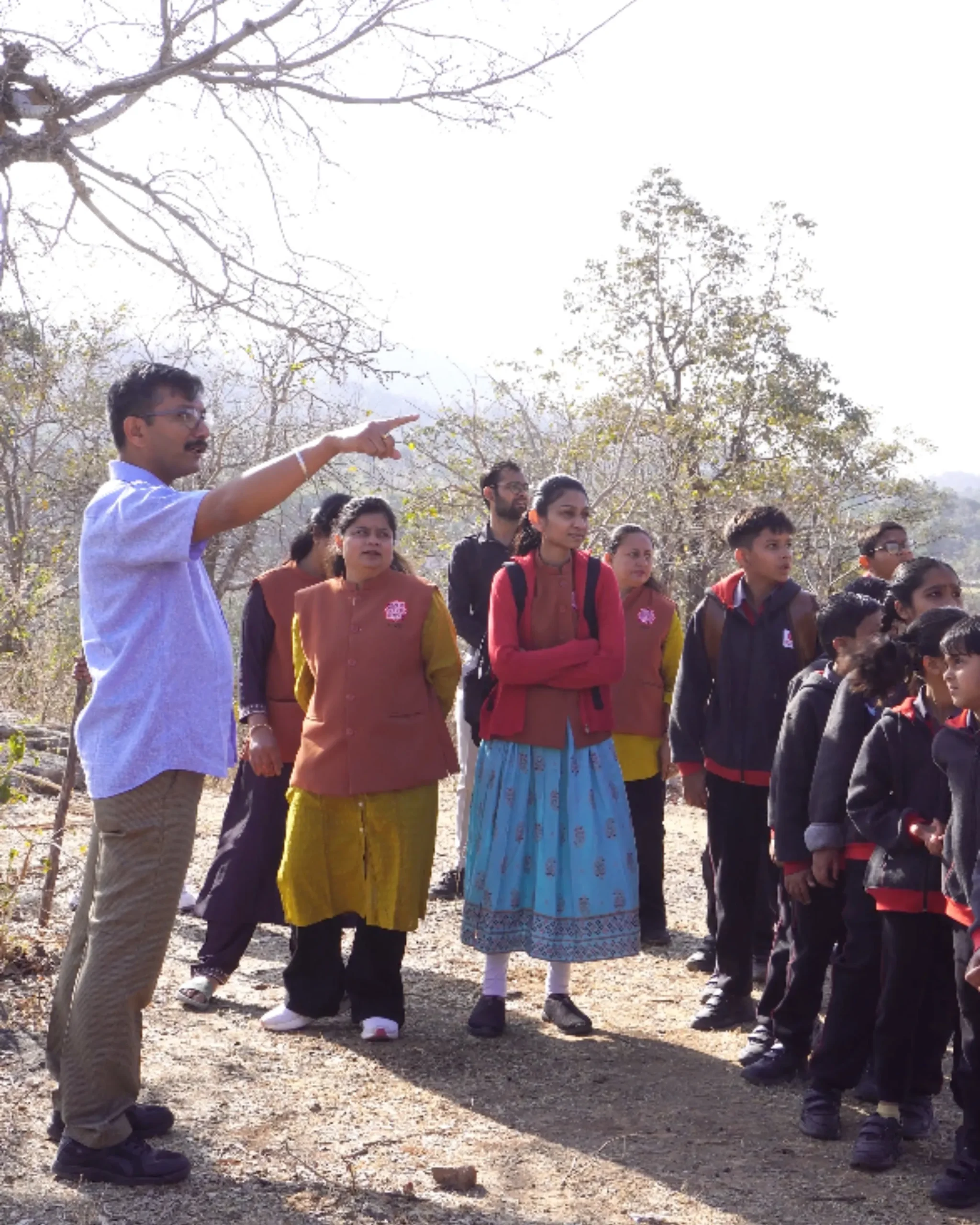 Group On Nature Walk With Principal