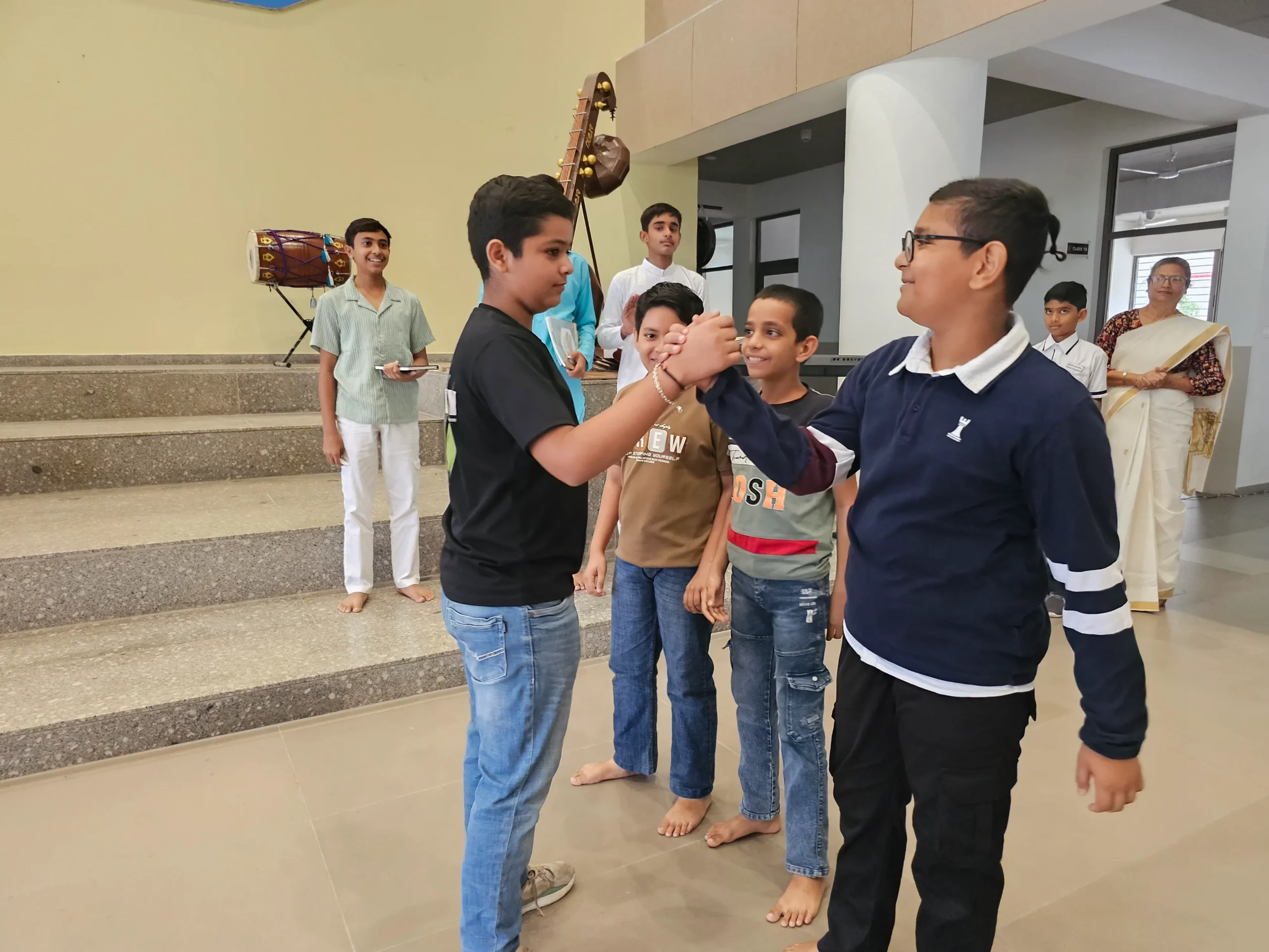 SSI Ambaji students learning together on the green campus in the Aravalli valley