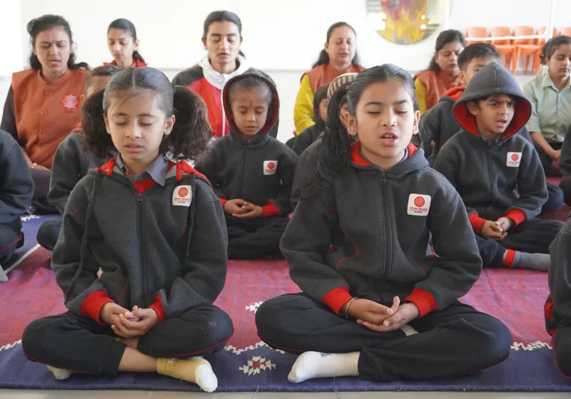 SSI Ambaji students in a morning meditation and yoga session starting the school day calmly