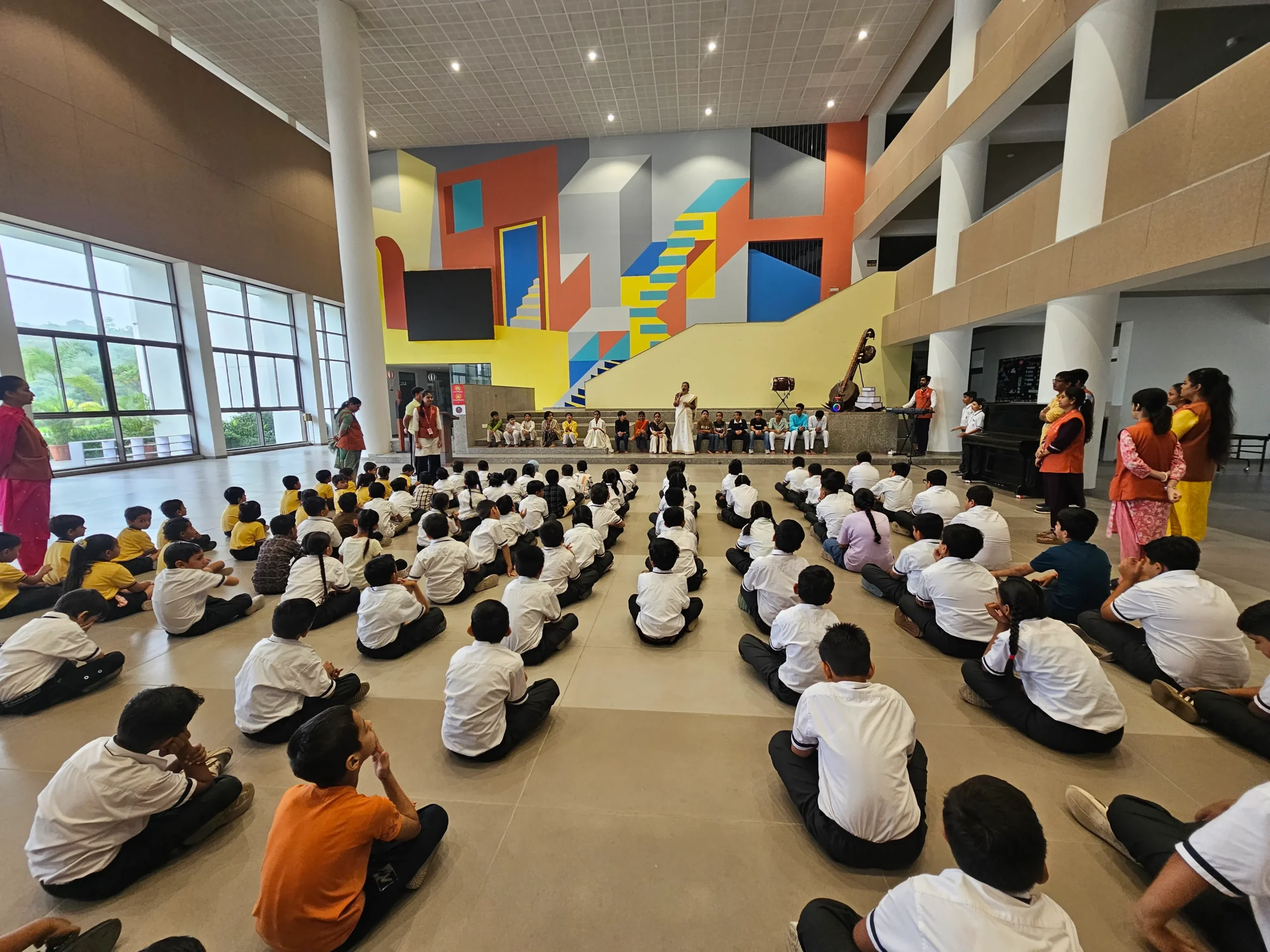 school-students-assembly-event-indoor-hall School Students Assembled for an Indoor Event