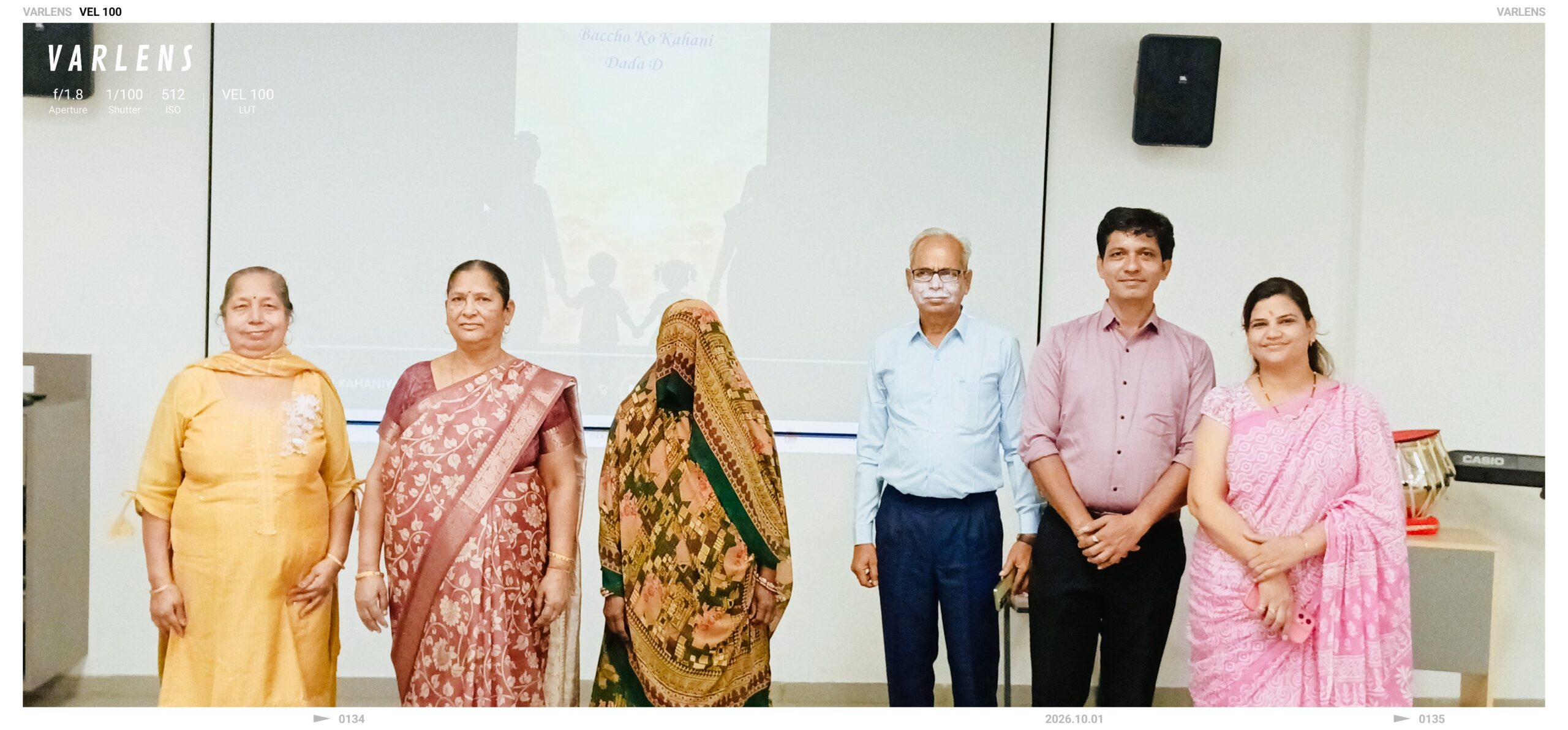 Teachers staff and students with grandparents on stage at Grandparents Day SSI Ambaji